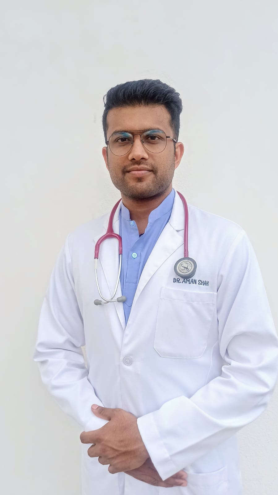 Dr. Aman Shah in clinical setting